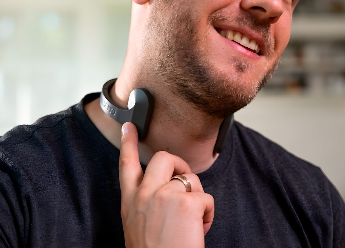 The Pulsetto wearable device resting around a person's neck